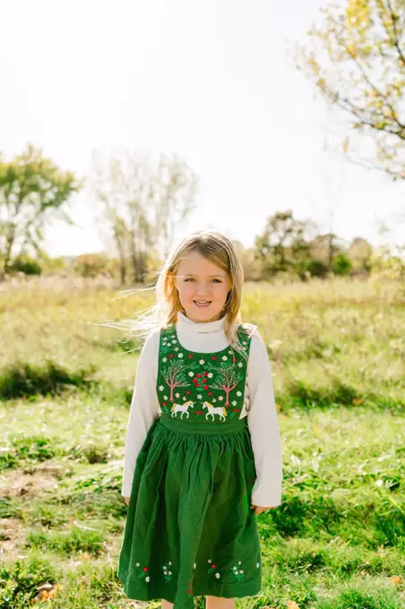 Straight on portrait of a young school aged girl