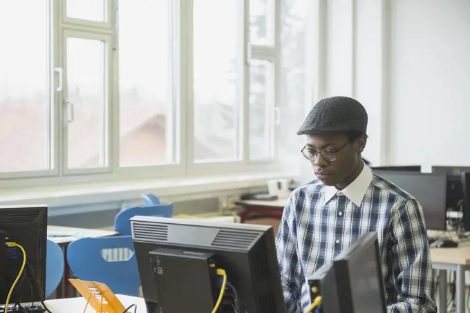 University student working on computer in Laboratory School, Bavaria, Germany