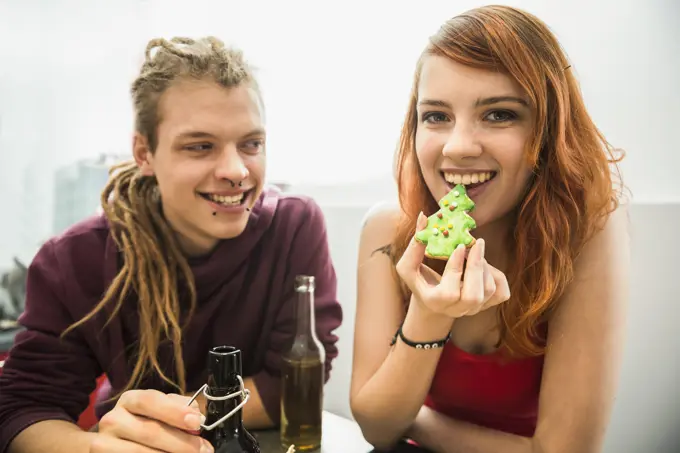 Young couple celebrating Christmas, Munich, Bavaria, Germany