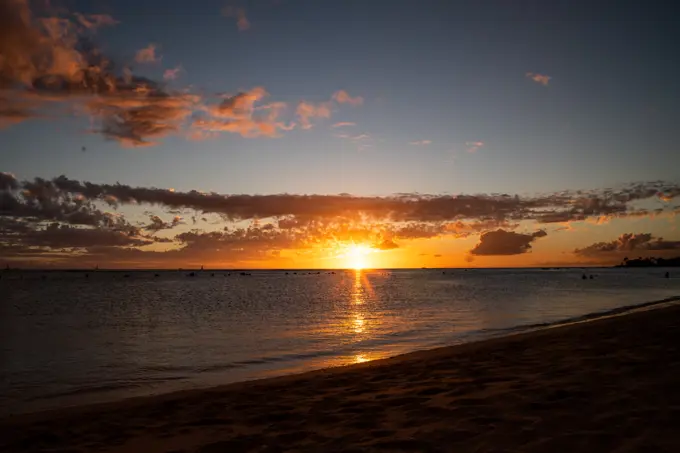 sunset ending over the ocean in hawaii