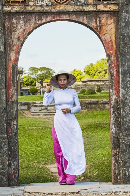 beautiful woman exploring the imperial palace in Hue / Vietnam