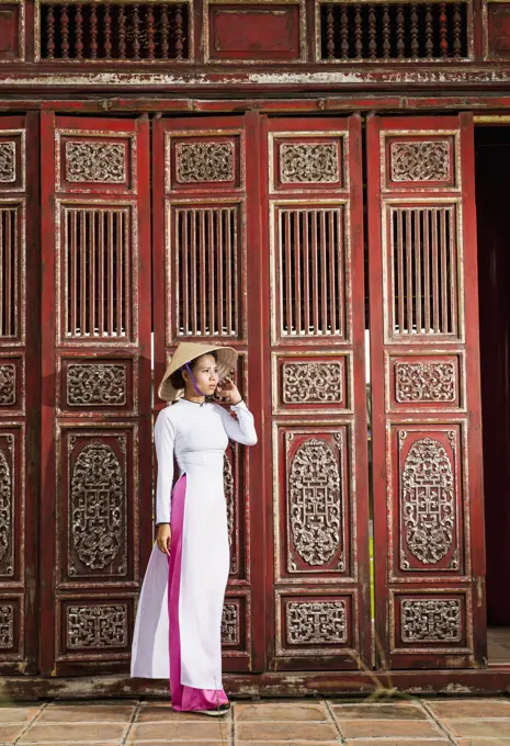 beautiful woman exploring the imperial palace in Hue / Vietnam