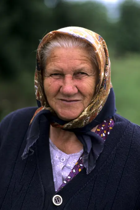 Croatia beautiful coast portrait of older woman with scarf near Dubrovnik Croatia