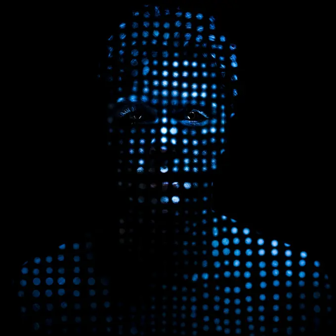 Portrait of a man made by blue dots