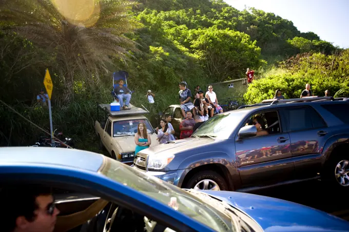 Scene at the 25th Eddie Aikau Big Wave Invitational. Biggest swell on the North Shore for 10 years brought in 30-50 foot waves at Waimea Bay on the North Shore of Hawaii. Haven't h