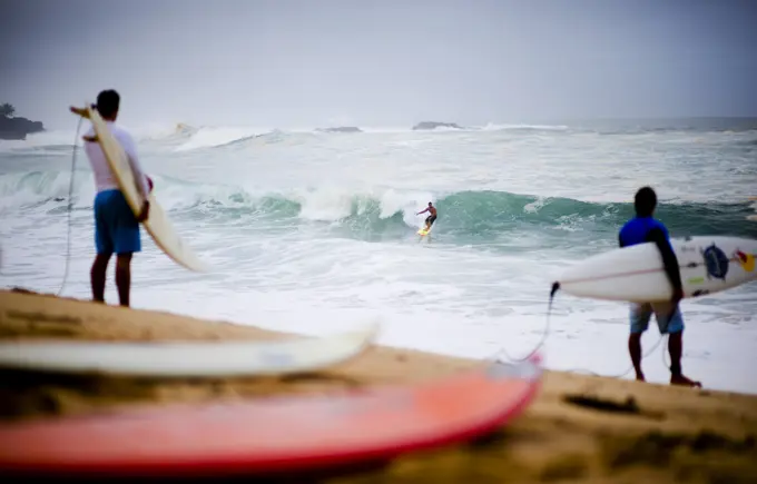 Surfer scene a day before the 25th Eddie Aikau Big Wave Invitational. The biggest swell on the North Shore for 10 years brought 30-50 foot waves to Waimea Bay, Hawaii.