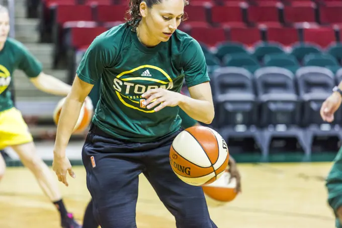 Female basketball player warming up before game, Seattle, Washington, USA