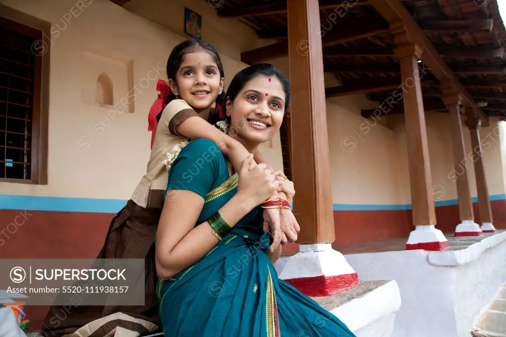 Portrait of a girl and her mother , Rural India