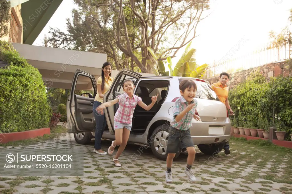 Family getting out of a car, Family