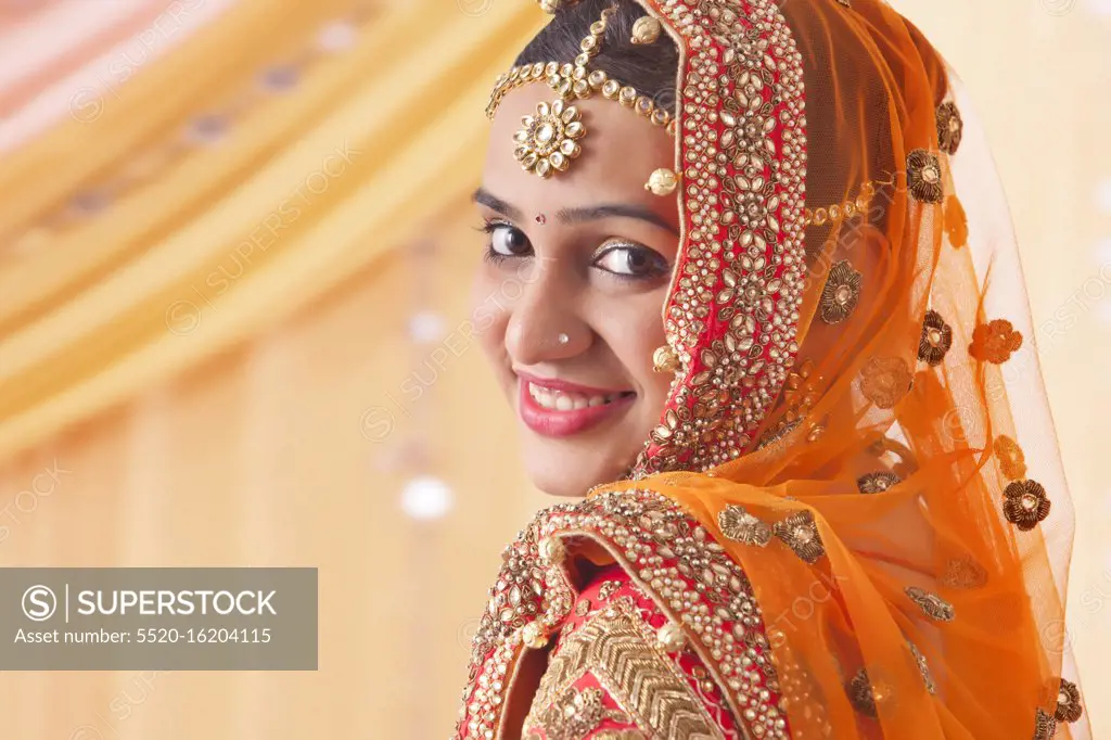 beautiful bride looking at camera , indian Bride