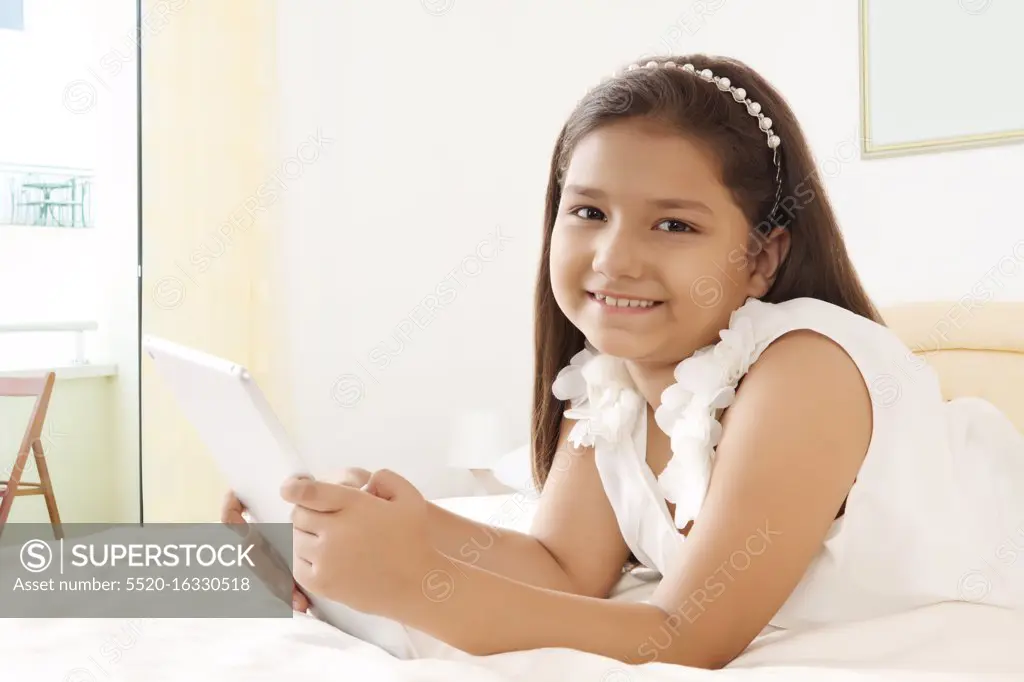 Girl using digital tablet