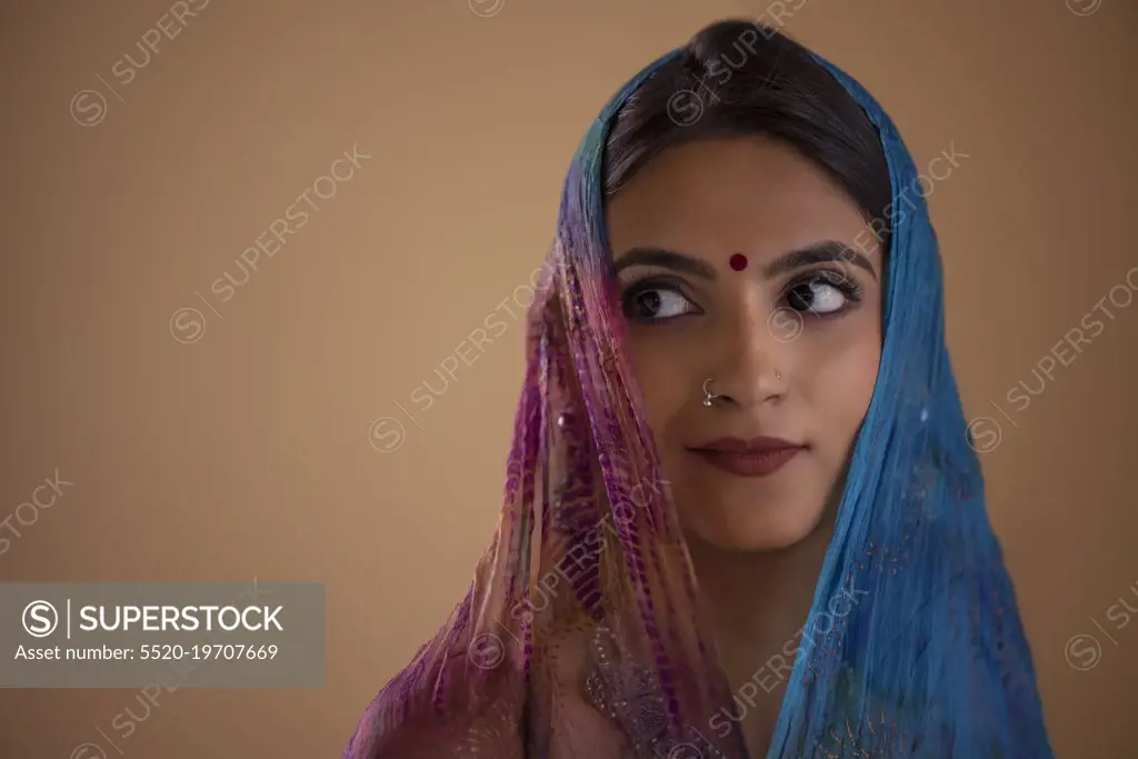 Portrait of an Indian woman in colourful veil