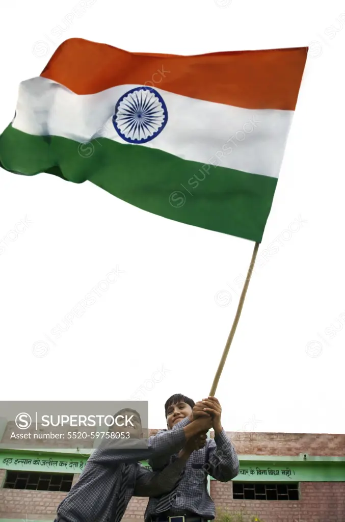 School boys holding the Indian Flag