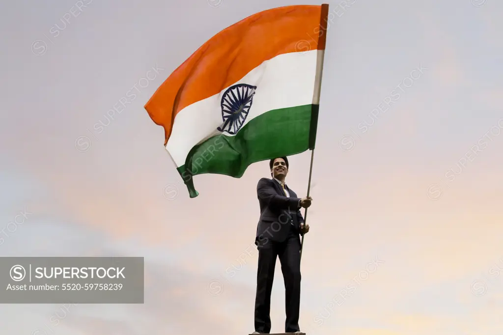 Businessman holding the Indian flag