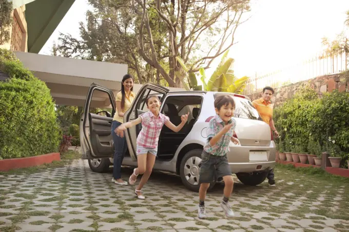 Family getting out of a car, Family