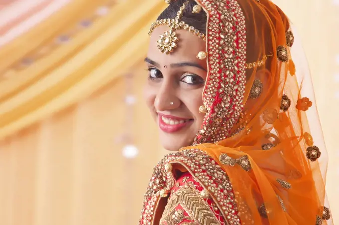 beautiful bride looking at camera , indian Bride