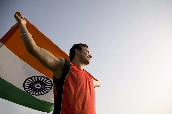 Man holding the national flag, INDEPENDENCE DAY