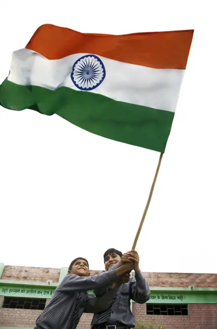 School boys holding the Indian Flag