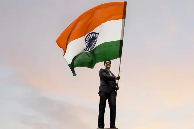 Businessman holding the Indian flag