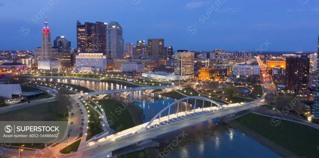 Colorful Lights adorn tall buildings along the waterfront in Columbus Ohio