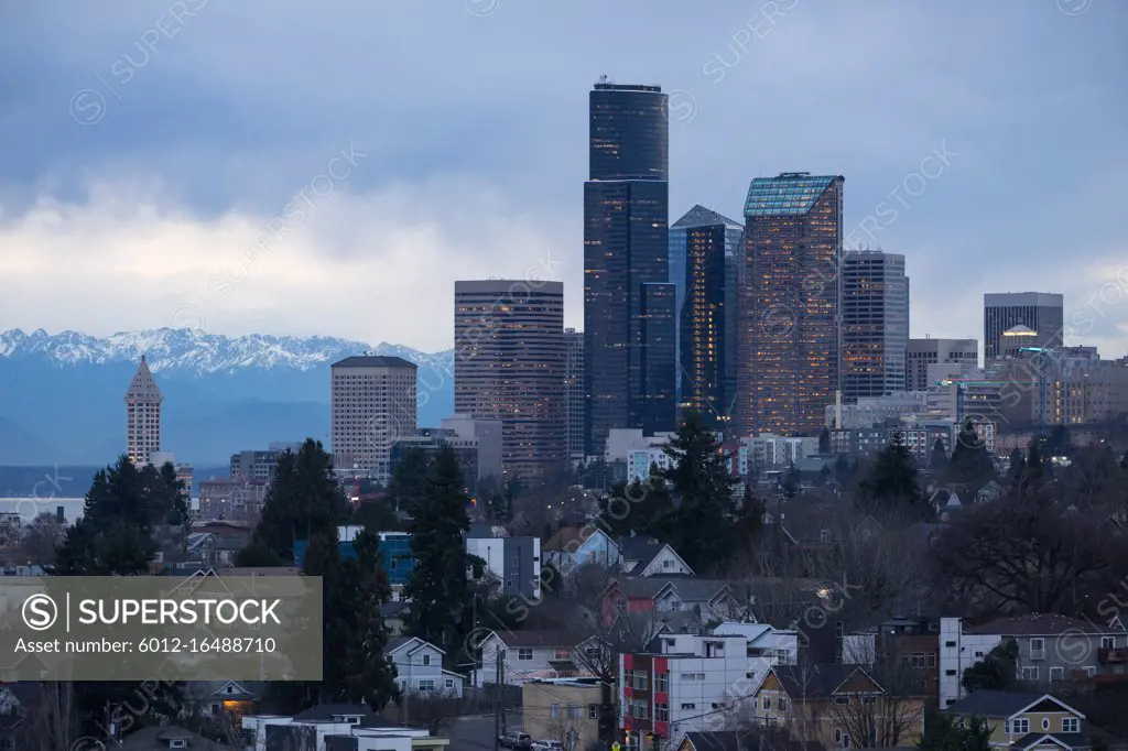 Tight composition core buildings downtown Seattle Puget Sound and the Olympic Mountains in the background