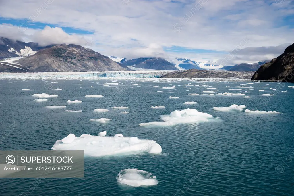 Horizontal composition ice and snow Kenai Fjords mountains snow water sea and glacier flow