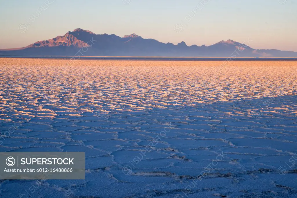 Long shadows fall on the Salt Flats near West Wendover Nevada on the border with Utah