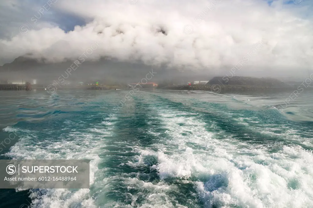 Looking out the aft end of a cruise ship water churning Seward Alaska