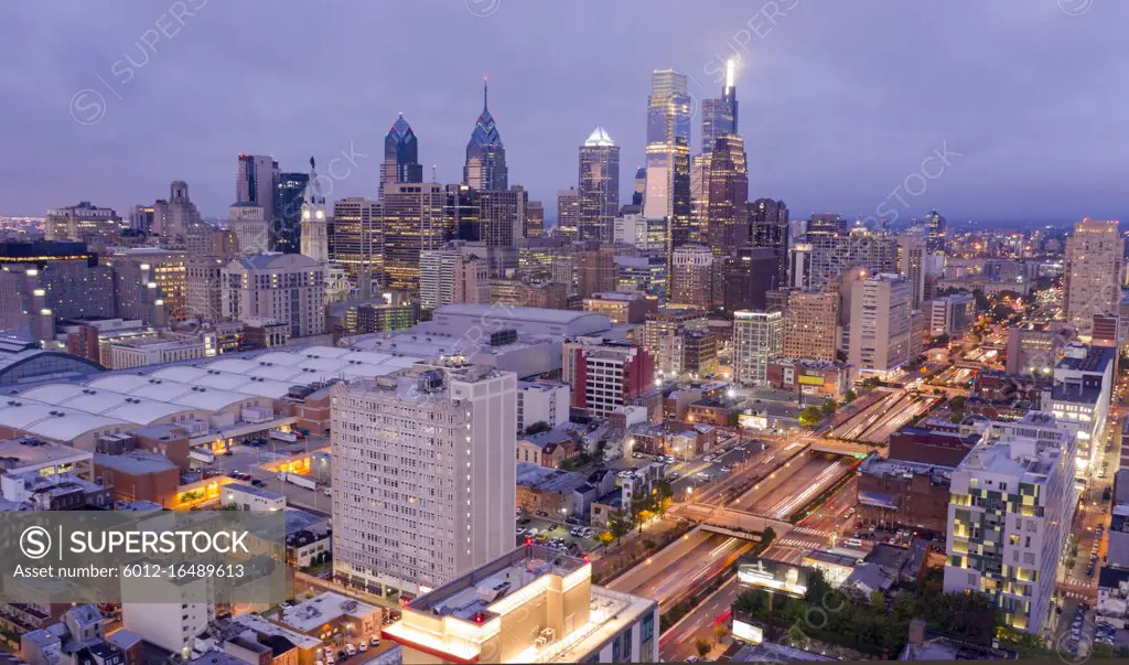 The office lights are bright as night comes to the city center of Philadelphia PA