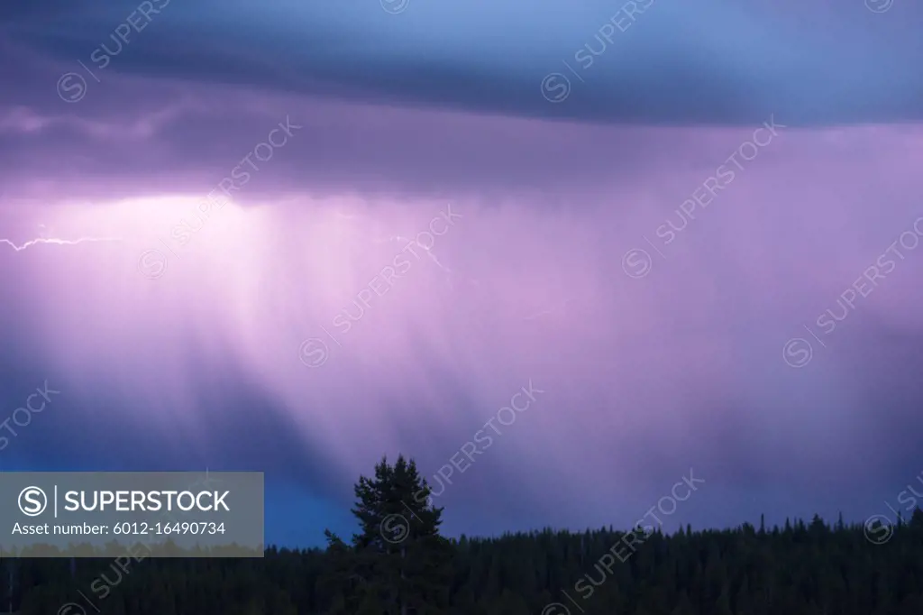 A storm passes thru quickly over Norris Canyone Road in Yellowstone