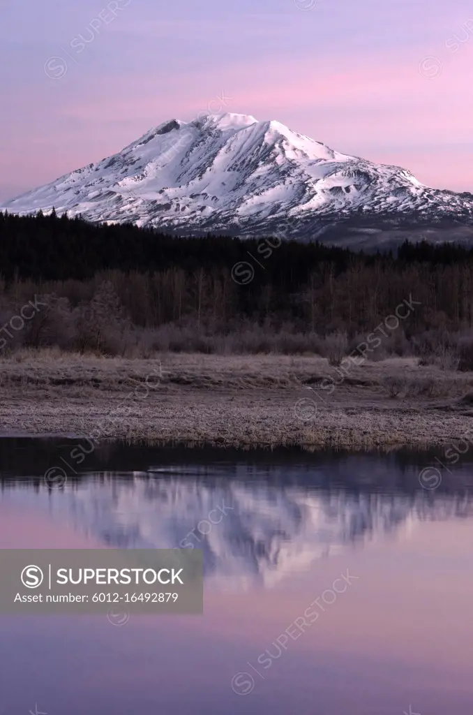 An amazing still lake scene in front of Mount Adams Washington