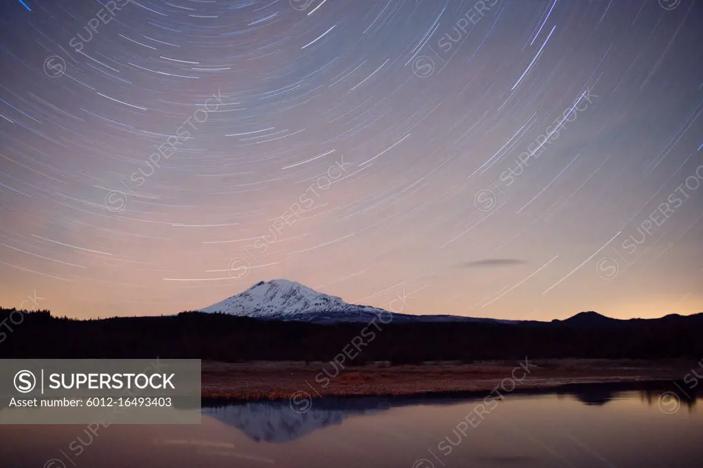 Mount Adams makes a perfect reflection as the Stars register as lines in a long exposure