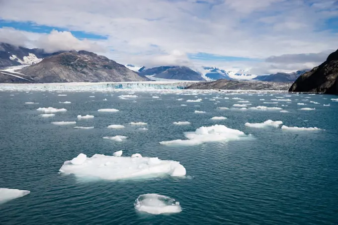 Horizontal composition ice and snow Kenai Fjords mountains snow water sea and glacier flow