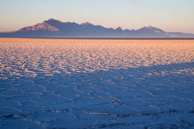 Long shadows fall on the Salt Flats near West Wendover Nevada on the border with Utah