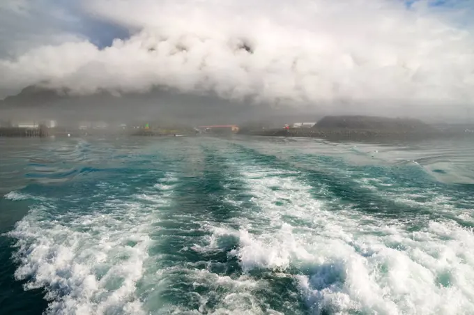 Looking out the aft end of a cruise ship water churning Seward Alaska