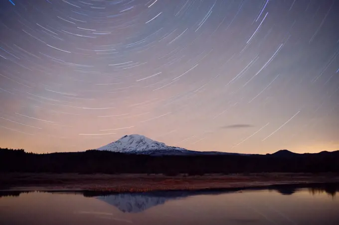 Mount Adams makes a perfect reflection as the Stars register as lines in a long exposure