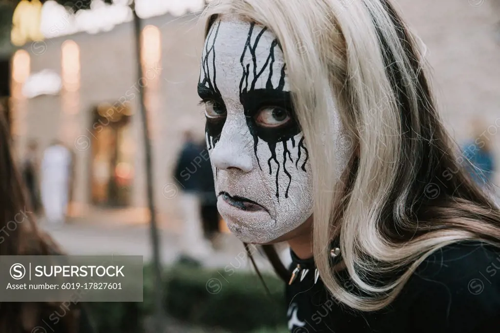 Corpsepaint girl metalhead, funny in city black white