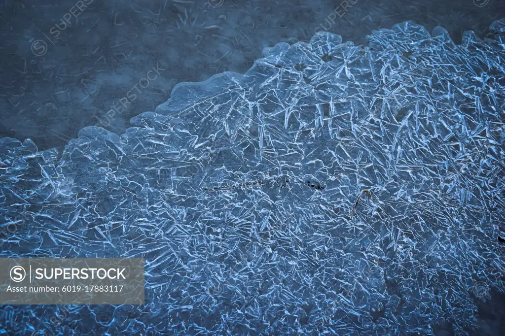 High angle closeup shot of a frozen car window