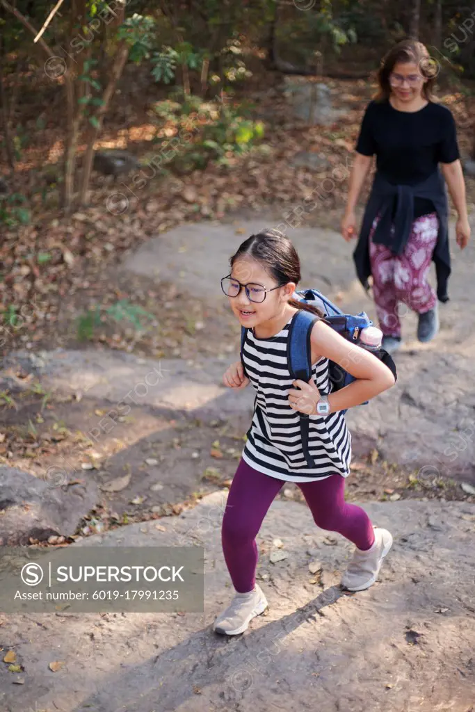 A girl and mother in weekend hiking