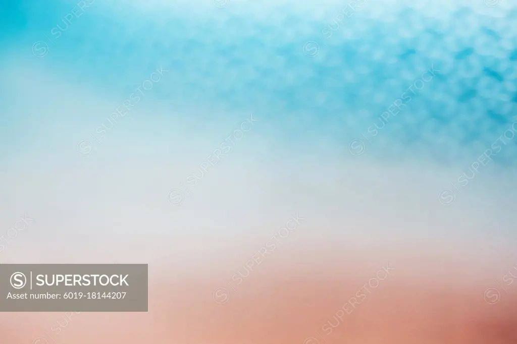 Contemporary abstract blue and orange shades with textured bokeh