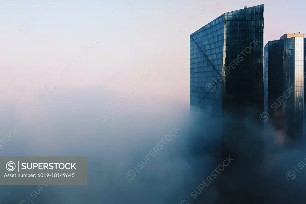 Dubai skyline with glass skyscrapers in fog