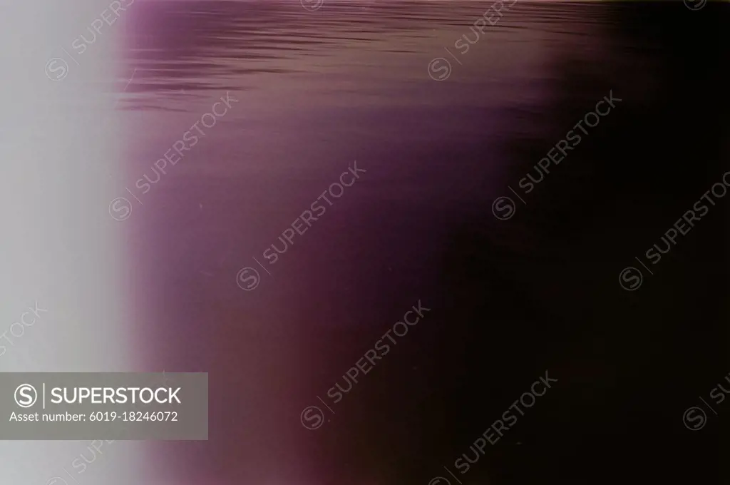 Abstract Purple Water Textured Film Background