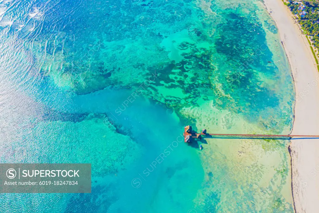 Aerial view of Maldives island, luxury water villas resort and w