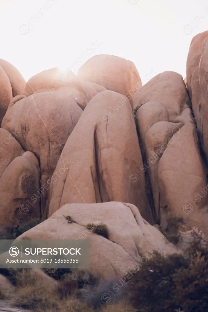 Sun shining among the rocks at Joshua Tree Park.