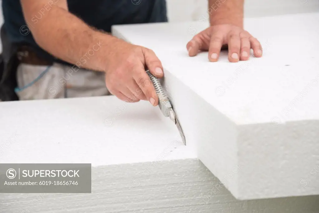 Cutting styrofoam block with exactoknife