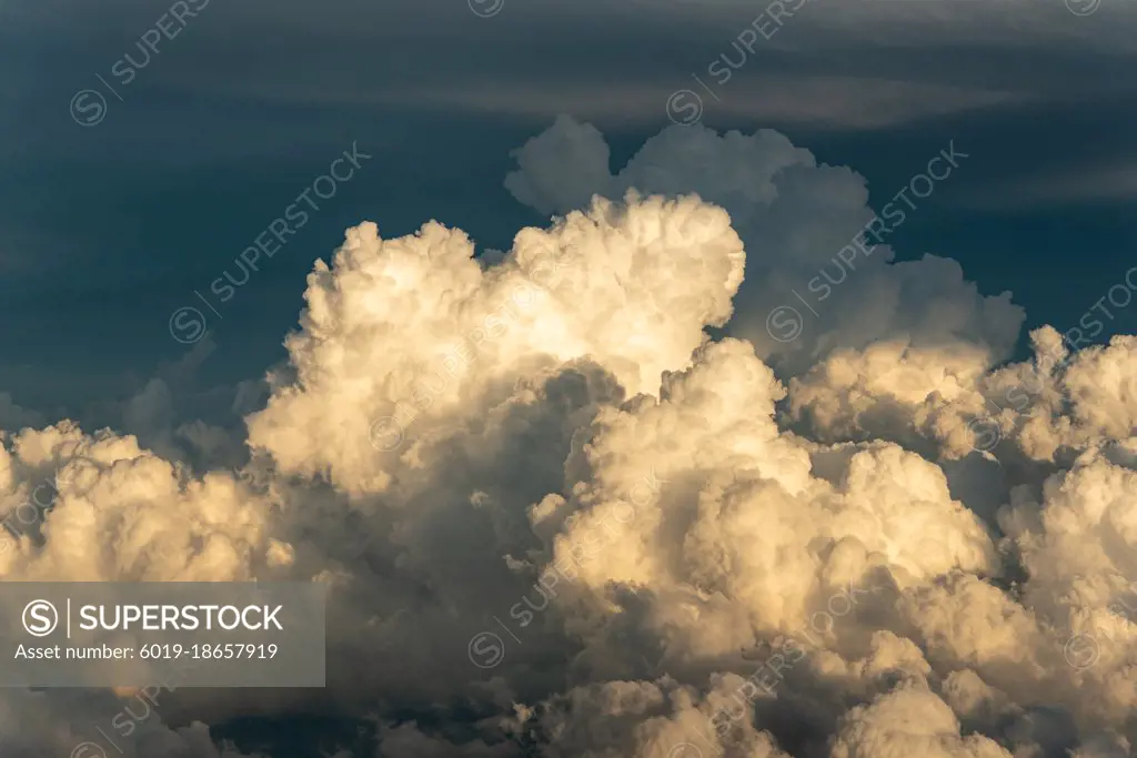 sunset clouds from the cockpit of and airliner