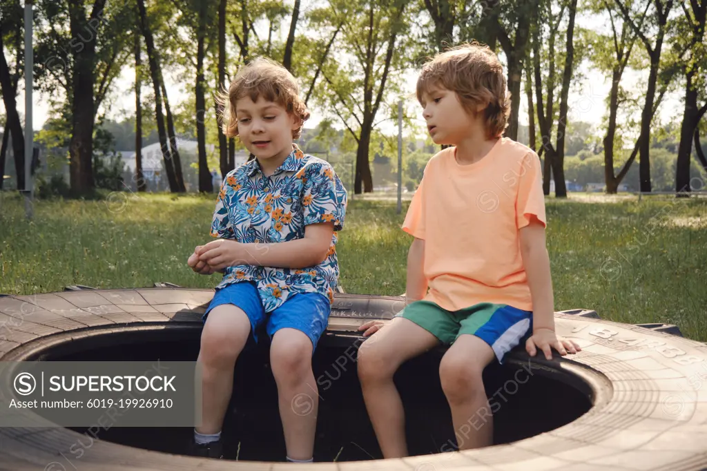 Kids playing outdoors, sport summer day activity