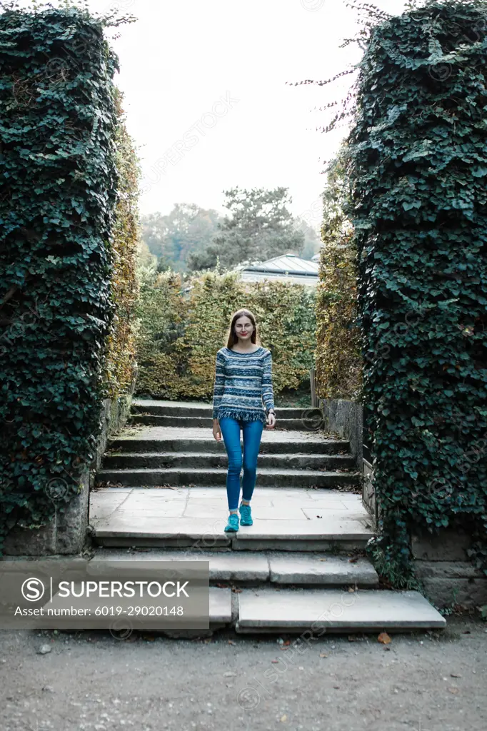 young female tourist walks the streets of Salzburg in Austria