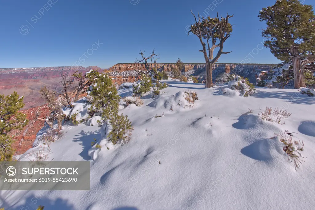 Snowy cliffs of Pipe Creek Canyon at Grand Canyon Arizona