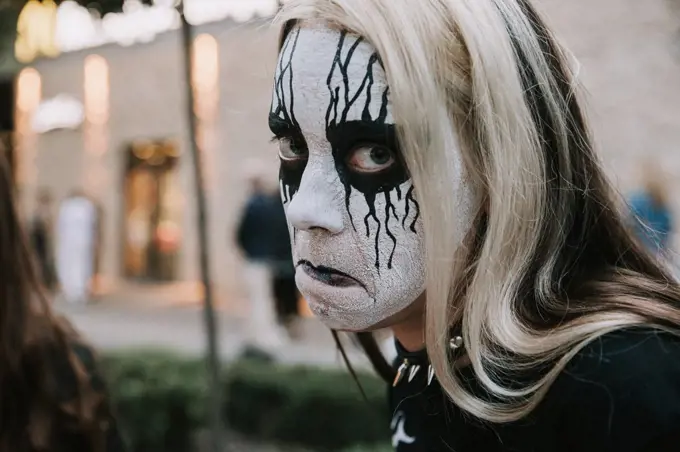 Corpsepaint girl metalhead, funny in city black white